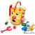 Animated pixel art of a cartoon character with red hair and blue eyes holding a small green object, standing next to a yellow bucket on white background.