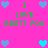 Pixelated graphic with bright pink background displaying repeated text "I LOVE BRETT FOX" in green block letters surrounded by blue and cyan heart icons.