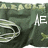 Green fabric background with repeated 'EAGLE' text, white rope-like swirls, and a small green star; animated text changes from 'AE' to 'BE' to 'CE'.