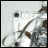A 48x48 pixel animated buddy icon featuring a contact sheet of two frames showing a white and brown mechanical object with text "ALL MIXED UP" on the right frame.