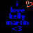 Pixelated blue text reads "i love kelly martin <3" on black background with orange heart symbol above the 'i' in first frame.