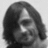Black-and-white animated icon of a person with shoulder-length hair, showing three sequential poses where the head shifts slightly left and right.