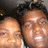 Two people in a close-up photo on a dark blue background with white text reading 'Can't Touch Us!' in pixelated font.