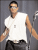 Pixelated static image of a person wearing white t-shirt and dark pants against gray background.