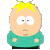 Pixelated character with yellow spiky hair, large white eyes with small black pupils, light skin tone, and a teal shirt with two circular patches on the sleeves.