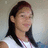 Pixelated static image of a person with long dark hair wearing a white top against a light background.