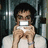 Pixelated image of a person holding a white object in front of their face, with pink text reading "Brendon Urie +" and "sidekick = GREATEST THING EVER!!!" on a white background.