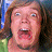 A 2x2 contact sheet of a Scooby-Doo 2 promotional image featuring two characters and text on a blue background, with the rightmost frame showing only gray transparency.