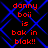 Red text on black background with blue lines, displaying 'danny boii is bok in blak!!' in pixelated font, repeated in two identical sections