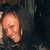 A person with dark hair and earrings appears in a of four , with the rightmost blank