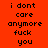 Red background with black pixelated text reading 'i dont care anymore fuck you' in four lines, featuring a blurred circular overlay effect on the left side.