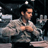Pixelated static image of a person in motion with arms raised against dark background, likely from early 2000s digital media.