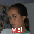 Pixelated image of a person with dark hair in a ponytail, wearing light-colored clothing and red text reading "ME!" at the bottom.