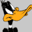 Animated cartoon duck head with orange beak, black and white face, pink tongue visible in open mouth against gray background.