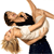 A pixelated image shows a man lifting a woman in a white top and dark pants against a plain background.