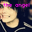 Pixelated image of a person in a dark blue shirt with white stripes, overlaid with pink text reading "the angel from my nightmare".