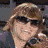 Six distinct pixelated portraits of individuals in a , with some wearing sunglasses and others smiling or neutral