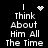 Black background with white pixelated text reading "I Think About Him All The Time" and two distinct animated symbols above the first line of text.