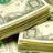 A green background displays a stack of US dollar bills on the left, with pixelated text reading "Yea" at top right, "Austins" at bottom left, and "Loaded" at bottom right.