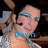 A pixelated image of a person with dark hair and blue eyeshadow, wearing a silver sequined top, with blue text reading 'Down', 'Sexy', and 'Beast!' in different frames.
