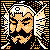Pixelated static icon featuring a stylized orange and black face with white accents, surrounded by geometric patterns on a black background.