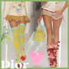 Two fashion models in a runway pose, one wearing yellow striped thigh-high socks and red shoes, the other in red floral boots, with a pink heart graphic and 'Dior' text visible.