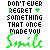 Pixelated text reads 'DON'T EVER REGRET + SOMETHING THAT ONCE MADE YOU' with green accents and a stylized signature below.