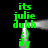 Green pixelated text 'its julie duhh' and ':) illy' arranged in a mirrored frame with gray smoke-like shapes on black background
