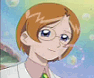 Animated sequence showing a character with short orange hair and glasses transitioning to a character with long white hair and a golden headpiece against a pastel background.