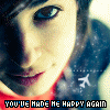 repeated pixelated images showing a person with blue eyes and red lips, wearing a red top with a blue patterned background and text reading "YOU'VE MADE ME HAPPY AGAIN"