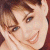 Pixelated image of a person with light brown hair resting their head on hands, next to green text reading 'Original Icons .com' on dark background.