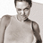 Static 48x48 pixel icon showing a shirtless man with short dark hair in grayscale tones, cropped to upper torso and head against plain background.