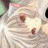 A 48x48 pixel buddy icon split into two frames showing a close-up of an anime-style character's face on the left and text on a black background on the right, with visible pixelation and dithering effects.