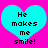 Two identical cyan hearts on a bright pink background with black pixelated text reading 'He makes me smile!' inside each heart.