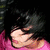 Pixelated image of a person with dark hair wearing pink clothing, overlaid with bright green and pink text reading 'brian my baby !!!!'