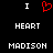 Black background with white text and red heart symbol arranged in a pattern