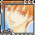 Pixelated close-up of a person with orange hair and light skin, framed by layered borders against a blue background.