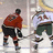 Pixelated hockey scene with two players on ice, red background text reading "Minnesota Wild" and "Derek Boogaard my baby!!! #24" in green.