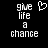 Pixelated text 'give life a chance' with a heart symbol above the word 'life', displayed on black background.