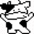 Black and white pixelated cow with irregular black patches on a white background, viewed from above.