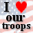 A split-screen animated buddy icon with two distinct sections: left side shows "I ❤️ OUR TROOPS" text over a pixelated American flag background, right side displays green neon-style text on dark green background.