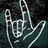 A pixelated image shows a white hand gesture on a dark teal background with the text "I love you" in white on a black background.