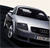 Pixelated static image of a silver sedan with dark tinted windows and visible headlights, positioned at an angle against a dark background.