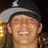A pixelated image shows a person wearing a dark cap with a light brim on the left, next to bright pink background with black text reading 'my love ross 14' on the right.