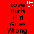 Red background with black text reading "Love Hurts If It Goes Wrong" and a white pixelated heart symbol above the text.