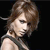 Pixelated close-up of a person with light brown hair styled in an updo, wearing a dark sleeveless top against a black background.