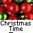 Pixelated image of red spherical ornaments with green accents, overlaid text reading "Christmas Time" and "Instant Icons .com".