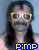 A person with long dark hair and a mustache wears yellow-framed sunglasses, standing against a light blue background with the text "PIMP" in blue pixelated letters below.