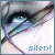 A close-up of a stylized eye with tears, featuring the text 'silent' and 'tears' in blue pixelated font.