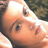 Static 48x48 pixel icon showing a close-up of a person's face with visible eyes, nose, and mouth against a blurred background.